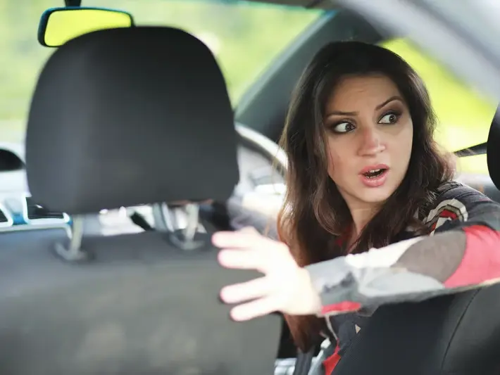 Illegal left turn accident attorney reviewing crash evidence near State Farm Stadium in Glendale AZ